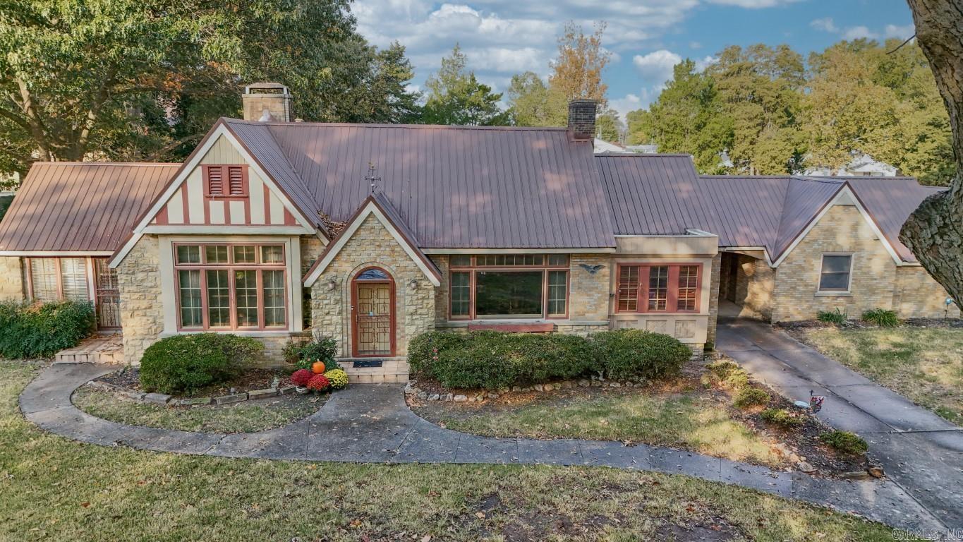 ***Seller offering owner financing option***** Step into history with this unique 1935 home that masterfully blends vintage charm with modern convenience. Recent upgrades include a new roof, water heater, and an automatic whole-house generator, making it move-in ready. Inside, original wood details, built-ins, and doors showcase the era's craftsmanship. The kitchen retains its original cabinets, classic flooring, and a rare metal countertop, making it both functional and a conversation piece. All appliances are included for your convenience. Outside, enjoy a serene escape with a handcrafted fountain, concrete picnic table, and a custom bar created by a renowned artist—perfect for entertaining. Additionally, a separate 2-bedroom cottage on the property offers an ideal Airbnb retreat. Registered with the National Historic Registry in 2010, this home combines timeless elegance with modern amenities. Don't miss out on this rare gem. Schedule your viewing today! For more history, visit sah-archipedia.org.