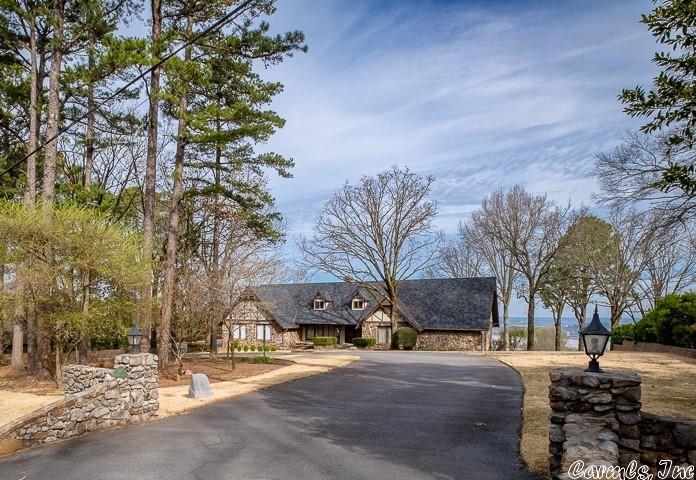 Stunning River View Estate. The absolute perfect setting for beautiful family living and memorable entertaining.  Gorgeous views, Exquisite craftsmanship and quality construction. Fabulous large family room with soaring ceiling, walls of windows along with stone fireplace. Formal living and banquet sized dining.  Large kitchen with breakfast. Spacious primary suite with luxurious bath on the main level.  3 large bedrooms on the upper level. Lower level has game room with w/FP, sauna, full bath, bar area and access to terrace and pool. Abundance of storage/workshop. Extraordinary outdoor entertaining with s/w pool and full tennis court all set on gorgeous, oversized lot.