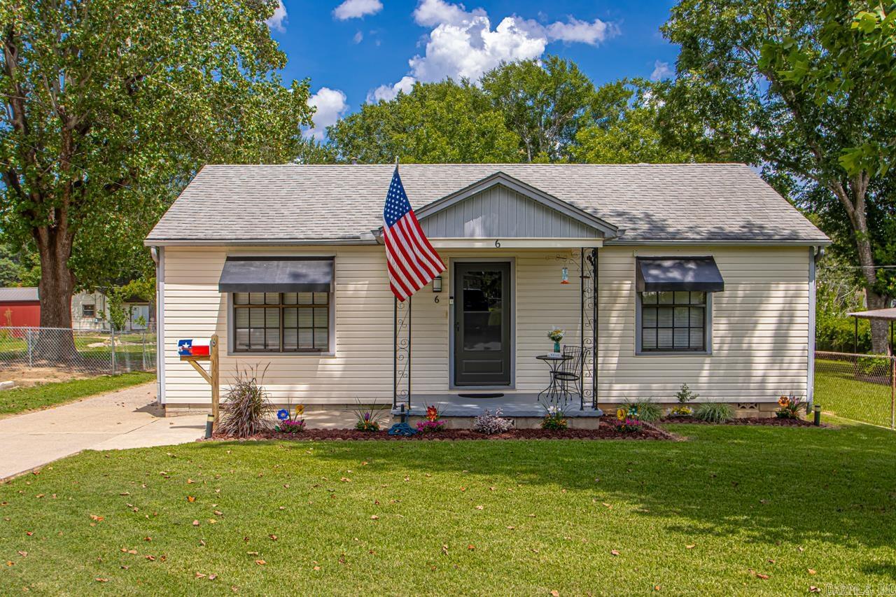 This adorable 3 bed, 2 bath home on Scenic Hill in North Little Rock has been meticulously maintained and is full of updates throughout. Situated on a large 0.25-acre lot, it features a spacious 1,000+ sq ft heated shop with a 1/2 bath and a small attached office that includes a window A/C unitāperfect for work or hobbies. The bathrooms have been updated, there's a new HVAC system, a new deck, and the roof is only 7 years old. The backyard is perfect for entertaining, with a beautiful patio area and turf for easy upkeep, plus a large shed that offers additional storage. Located just minutes from downtown, you'll enjoy quick access to the interstate and all the amenities of Argenta and Downtown Little Rock. This property is a true gem with so much potential!