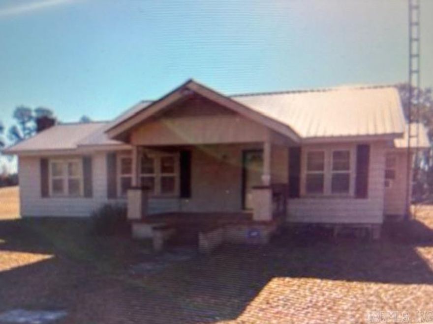 Three bedroom two baths frame home on 15 acres.