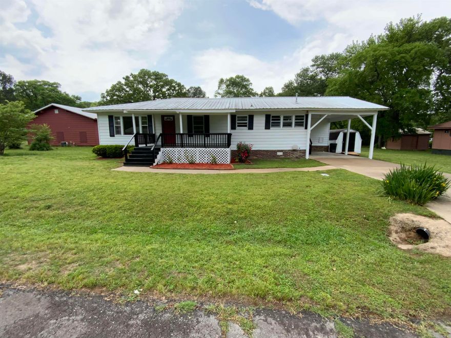 LOOK AT THIS CHARMER! This is the perfect starter home or investment property! This home offers 3 large bedrooms 2 full baths. Separate dining room with a large kitchen. Laundry room has windows for natural light & is large enough for a folding table! This home has new paint and new carpet in the bedrooms! Move in Ready!!! Call today for an appointment!!!