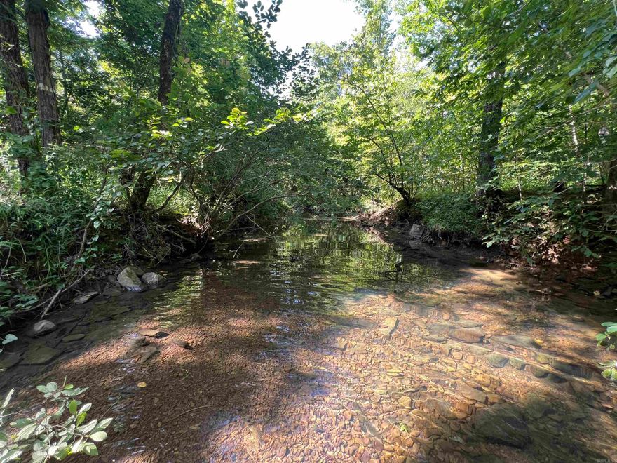 Nestled just outside the Oxley community in Searcy County, Arkansas, this 41.64-acre recreational hunting property offers a secluded retreat for hunters and outdoor enthusiasts alike. The land features a winding creek, a Redneck blind, multiple tree stands, and an established network of trails throughout the property. Whether you’re looking for a private hunting haven or a peaceful escape into nature, this tract provides a versatile setting with abundant wildlife and natural beauty. An adjoining 29.56-acre tract is also available for those seeking additional acreage and expanded opportunities. Seller will provide a utility easement to the property at closing.