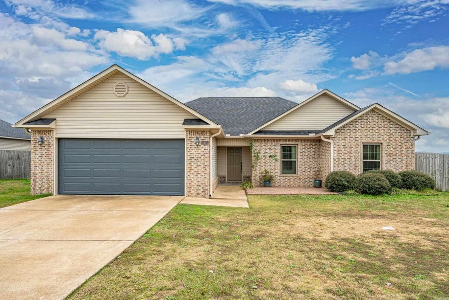 Beautiful brick home tucked inside a highly sought-after neighborhood! Trendy paint colors and a modern fireplace insert bring all the cozy vibes the moment you step inside. The wonderful floor plan flows easily throughout the home, and the spacious bathroom features a double vanity, separate tub and shower, and convenient his-and-her closets. Huge fenced in backyard and a covered patio. Charming, comfortable, and in a fantastic location—this one’s a must-see!
