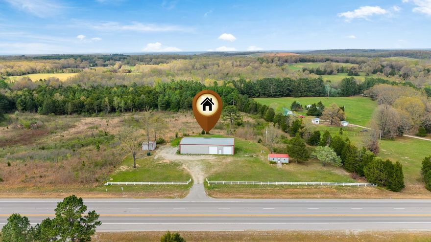 Built for those who live and work in the fast lane--this 16-acre, highway frontage, live/work setup between Ash Flat and Salem puts you right where you want to be: rural, private, still connected. With highway frontage, this property gives you something most rural shops don't-visibility.  Whether you're running a performance shop, flipping builds, or just want a place where your work is accessible, the exposure is there.  With easy access to nearby hubs like Mountain Home, Batesville and even West Plains within driving distance- you're positioned right in the middle of North Arkansas car country! The centerpiece is a 1200 sq ft shop equipped with a car lift-ready for anything from weekend wrenching to full scale builds or business use. No guesswork, no start up headaches-just pull in and get to work! Attached is a 1200 sq ft 2 bed 2 bath living space so you can keep your tools, projects and momentum right at hand. The land offers a strong mix of cleared ground and timber, giving room for trailers, parts, cars, equipment and future expansion. Two additional outbuildings have served as office space and storage. This property isn't set up for the average buyer-and it isn't meant to be