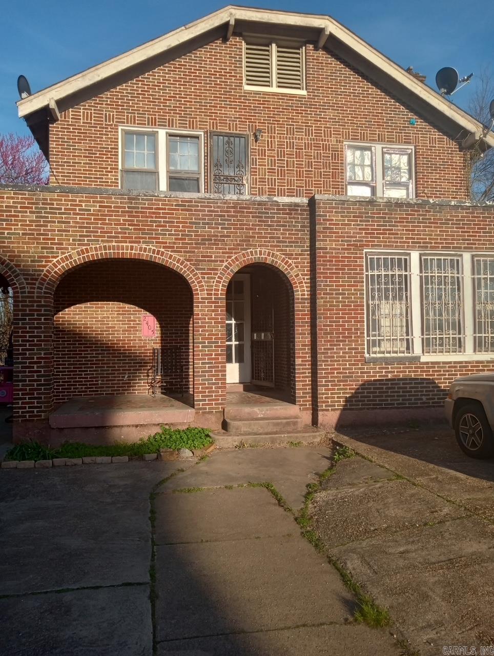 Great income producing property. Four-plex close to downtown and I-30 . The units have are large with large bedrooms. Three units have washer and dryer hookups. Lots of work has been done on these apartments. Freshly painted. New wood flooring in Unit A. New piping, A/C units have been serviced. Roof cleaned and gutters cleaned. The owners of this property keep it well maintained. Beautiful staircase leading up to apartments A and B. Great potential with great cash flow for the price.
