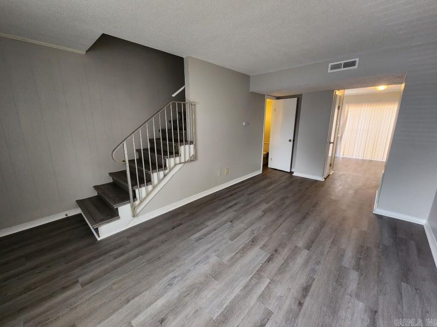 All information available at YOUR RENTAL TEAM dot COM, including self-showing instructions & application. No need to call, go to website above. Welcome home to Bristol Manor Townhomes. This updated unit at 101 Ellis Unit H is located in Little Rock's historic Santa Fe neighborhood, sitting in a convenient location just off of Markham, to all Little Rock amenities. Updated features include new roof, new paint, new luxury vinyl plank flooring, new fixtures, and new kitchen & appliances, plus private back patio. 2 bedroom and full bath upstairs, with half bath downstairs. Refrigerator, central heat and air, dishwasher, range/oven, water heater, are included. Some pets allowed with additional pet fees.