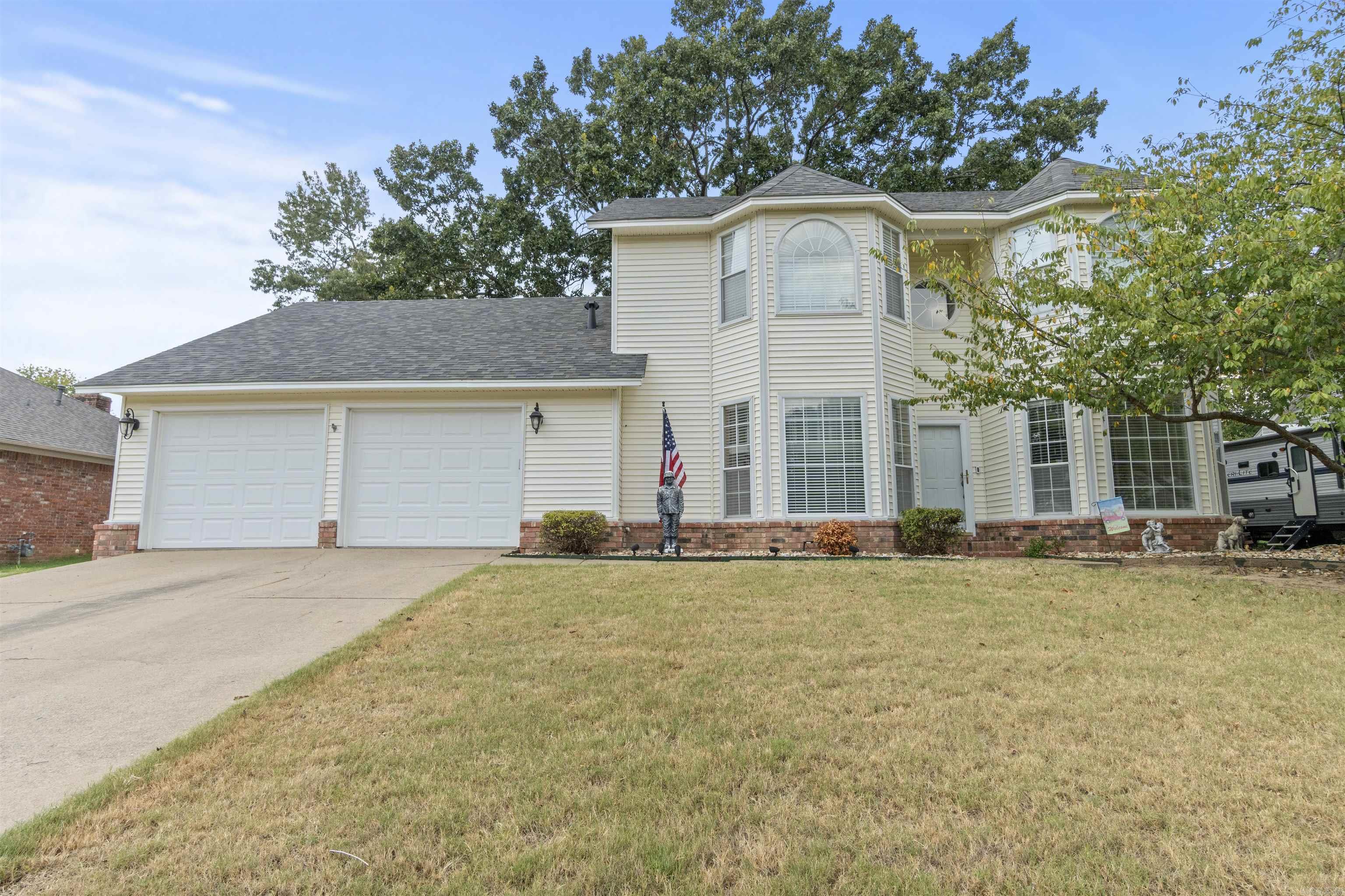Welcome to 305 Pickwicket Dr, a well-maintained 4-bed, 2.5-bath two-story home in a quiet Conway neighborhood. This home features beautiful hardwood floors in the main living areas and a formal dining room, perfect for family meals or entertaining. The spacious living room is bright and inviting, ideal for relaxing or spending time with loved ones. The kitchen offers modern appliances with granite countertops, plenty of cabinet space, and a cozy breakfast nook. The large master suite includes an en-suite bath and ample closet space, while three additional bedrooms offer plenty of room for family or guests. A standout feature is the 24x24 insulated metal building with heating and air, offering great potential for a workshop, storage, or hobby space. Outside, the large backyard provides plenty of room for outdoor activities or gardening. With easy access to schools, shopping, and dining, this home offers both comfort and convenience. Schedule your showing today!