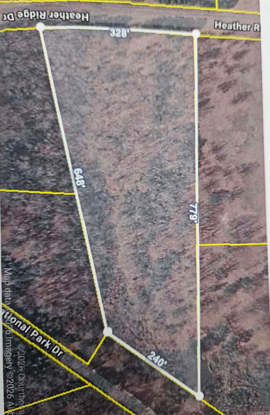 wooded and sloped 4.12 acre lot at Gill Lake in Heatherwood Subdivision. Street frontage on Heather Ridge dr.