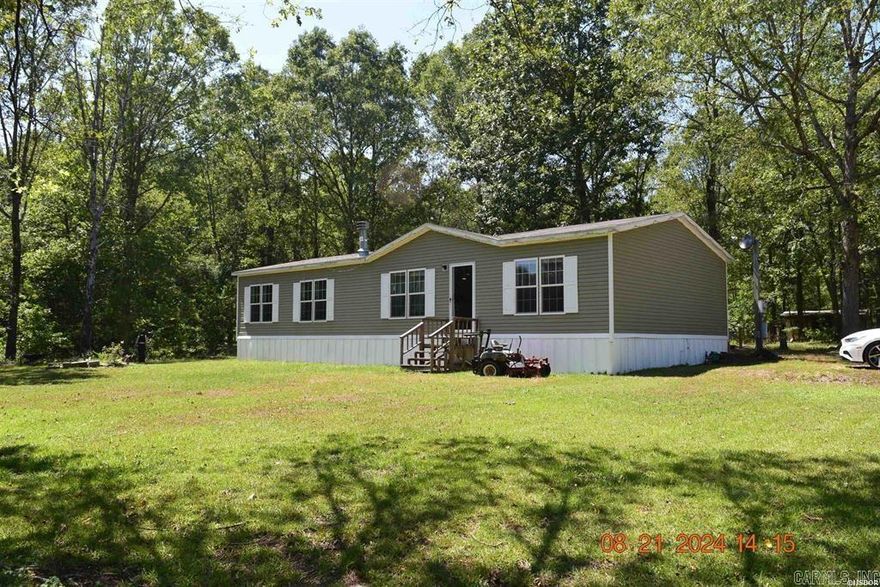 Looking for a serene retreat with room to stretch out? Check out this well-maintained 2015 mobile home featuring 3 bedrooms and 2 bathrooms, nestled on a generous 3.2-acres. Enjoy the privacy and freedom of expansive outdoor space, perfect for gardening, relaxing, or outdoor activities.
