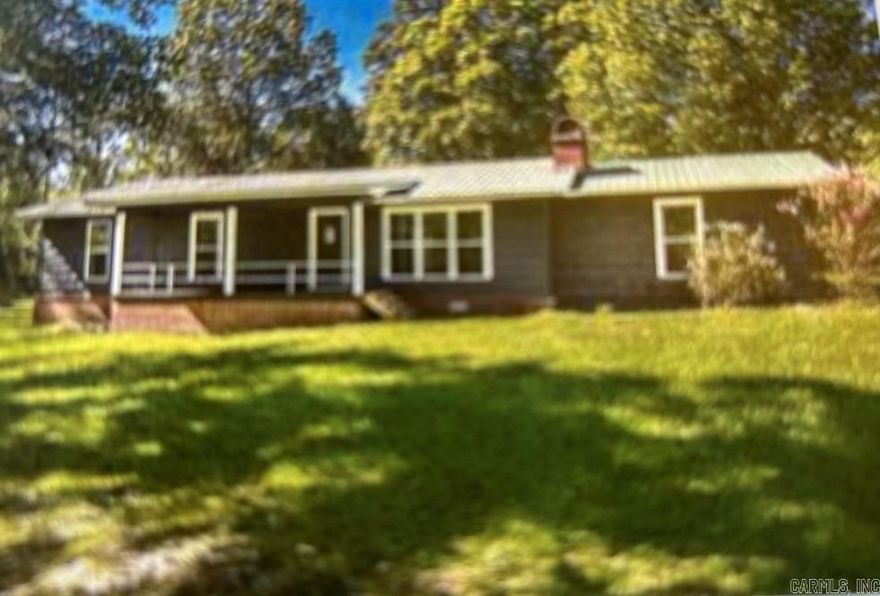 Located halfway between El Dorado and Magnolia, this country home sits on over 13 acres of land. Inside, you will find a newly renovated home with beautiful granite countertops in the kitchen. This home is equipped with 2 living areas and 2 locations for laundry if needed. Outside sits 1 fenced in pasture, 1 open pasture, 2 ponds, 1 shop/storage building, and a barn. Although the address in on the highway, you cannot see the road from the home. Perfect for privacy!    A few, but not all, updates over the past few years  2020 - new central heat & air - Rheem  2022 - granite countertops in kitchen & bathroom  2022 - energy efficient windows installed  2023 - bathrooms/flooring/paint/kitchen/sunroom    Text/Call Alex today to schedule your private showing of this move-in-ready home at 870-904-5262    Listing Provided by Janâ€™s Realty of El Dorado    *Property is REALTOR owned