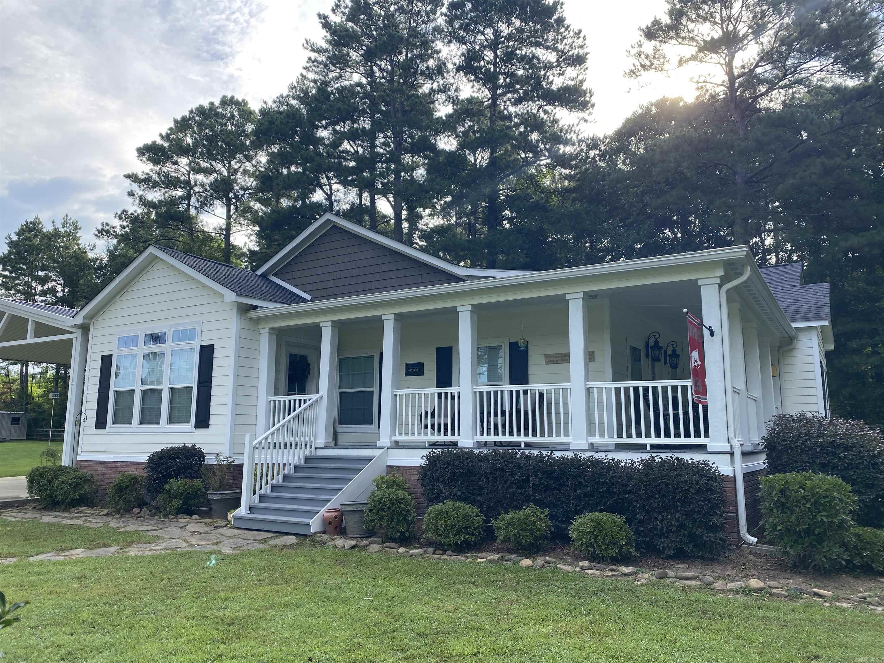 Peaceful country living just minutes from town. This beautiful home features a spacious open floor plan, neutral tones, and is in move-in ready condition. It offers 3 bedrooms, 2 bathrooms, 2,328 sq ft and sits on 2.17 acres. Every room in this house is designed with comfort and charm, making each space feel like home. The wraparound porch adds the perfect finishing touch. Take a tour of this property and experience its charm firsthand!