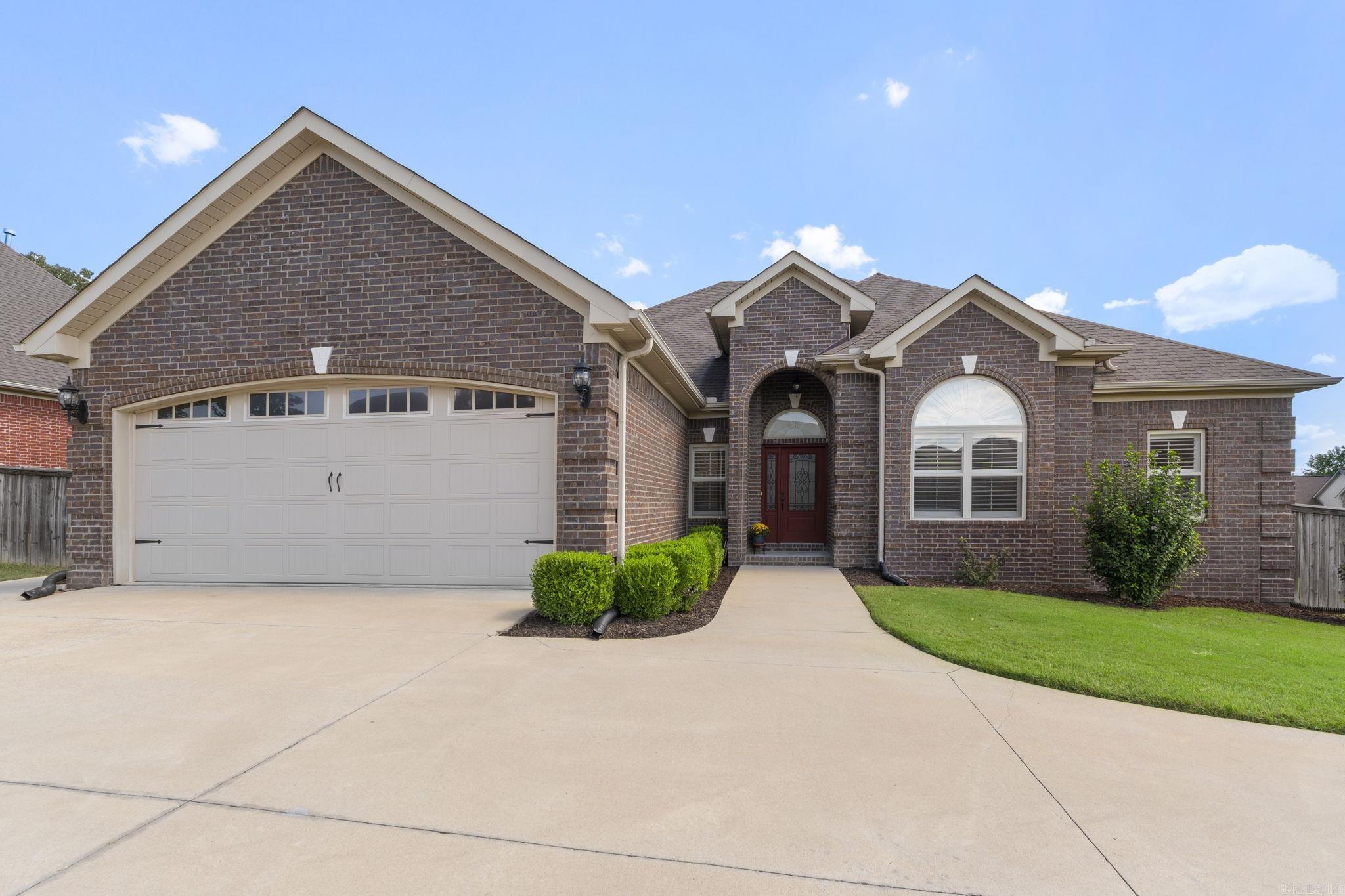 Nestled in the highly sought after golf course community of Greystone, this incredible property leaves nothing to be desired! One level, with 4bdms, 2.5 baths, 2,524sqft, a screened porch and spacious flat backyard! This home has been meticulously kept and it shows! The layout offers a semi-open concept feel, while still giving division to areas for individual enjoyment! Wood flooring, tile where needed, tall ceilings, luxury wood trim and plantation shutters make this home stand apart! The kitchen is spacious and open, offering Bosch + SS appliances with stunning granite countertops for easy cleanup! There's even a gas stove for all the true chefs! The primary bedroom offers an ensuite bathroom with a walk-in shower and closet! The U-shaped driveway offers plenty of space for parking as well as the two-car garage! Your favorite room in the house will likely be the incredible screened in back porch with access from both the dining area and the primary bedroom. The backyard is spacious offering touches like a pergola awning, paved brick walkway and a Zen style garden area for the ultimate relaxation! Magnolia and willow trees adorn the backyard! This home is a must see!