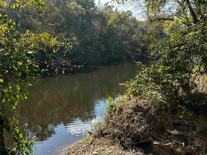 195 feet of beautiful River frontage! Reva's Retreat is surrounded by the National Forest and Irons Fork Creek, 1 mile N of Lake Ouachita + 2 mi. from Launching ramp.  The beautiful 100 acre development offers seclusion, unblemished, back-to-nature, spacious lots - water frontage & River access w/some restrictions, incredible views, and underground electric.  Fishing, kayaking, swimming, nature walks + trailhead for hiking are nearby, as well as amenities at HSV & Mt. Ida. Every day is a vacation with Peace and Quiet. This property is located in Reva's Retreat.
