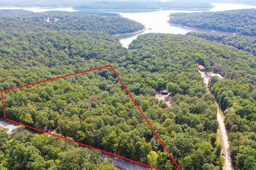 11.2 AC m/l Estate Lot bordering Corps land on Lake Norfork. A nature lovers dream with abundant wildlife to include deer ,turkey, eagles, and more. Domestic water line, sized for fire protection, available in roadway. High speed internet available. Property has had preliminary soil testing for septic system. Paved county road frontage which dead ends at lake. Lots sit well above lake, and well above the Corps flood zone. Protective covenants in place. Possible lake view with some clearing. Less than 10 minutes to Tracy Marina; 15 minutes to downtown Mountain Home.