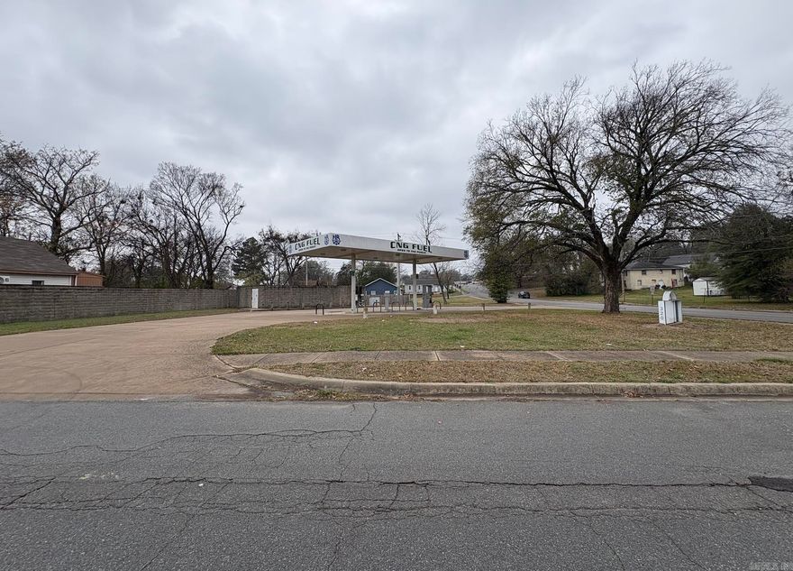 Prime commercial opportunity with exceptional visibility and high traffic counts—located just one block from I-30, which sees an impressive 130,000+ vehicles per day. Zoned C-3, this versatile property is ideal for a wide range of commercial uses. Previously a CNG station, the existing infrastructure provides the potential for a smooth conversion to a traditional fuel station, travel center, or other high-demand commercial operation.  This flat, corner lot offers superior access and frontage, making it perfectly positioned for maximum exposure and convenience. Whether you're looking to develop, expand, or invest, this property delivers strategic placement and endless possibility in a rapidly growing corridor.