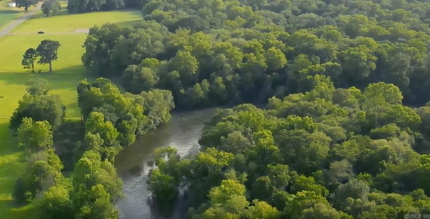 Lot 8 in Caddo Paddock Subdivision has deeded river frontage on the Caddo River. Paved county road access along Old Military Road, municipal water, permitted septic, underground electricity, fiber internet, and deed restrictions serve to protect value as well as enjoyment of the property. Restaurants, float outfitters, and I-30 are less than 1 mile away with Arkadelphia being only 5 miles south. The property has a unique history and is ideal for short term rental investment.