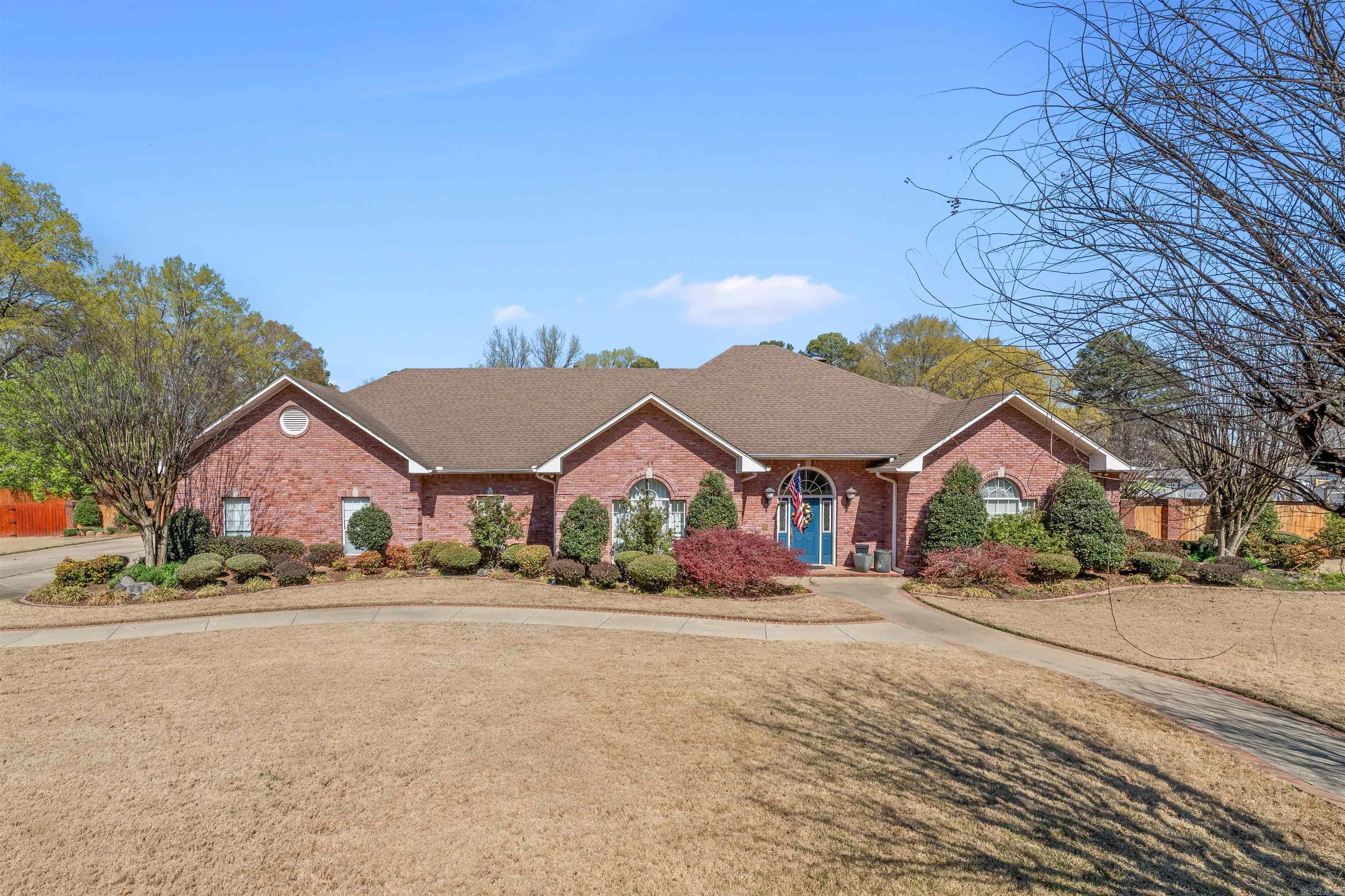 Completely renovated home at 10 Woodland Dr! Enjoy an open floorplan, perfect for entertaining. Chef's kitchen boasts a Subzero built-in fridge/freezer, center island, & modern finishes. Multiple living areas flooded with natural light, plus a cozy fireplace. One bedroom is currently a stylish office/library. Relax on the screened-in back porch overlooking a double lot & fenced backyard. Modern updates throughout! 3 Car Garage with an oversized driveway. Beautifully landscaped! Call or text for a personal tour!