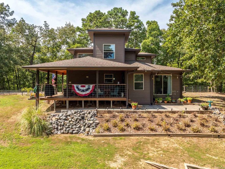 Beautiful lake view home situated on .42 acre corner lot.  This move in Ready, 2 bedroom 2 bath home has a bonus room for a 3rd bedroom or office.  Overlooking Lake Hamilton's main channel with spectacular views. Totally remodeled in February of 2020 with vaulted ceilings, custom cabinets, new plumbing, new wiring, new roof, new HVAC, new appliances, and new leaf guard gutters.  Look out on the lake and mountains while relaxing on a spacious deck and patio.