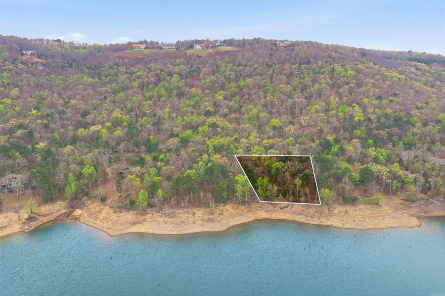 Opportunities like this don't come around often. This is 1.64 Acres of prime lake-side luxury property in Diamond Bluff Estates. The perfect location for the primary residence of your dreams or a best-in-class vacation home adjoining Greers Ferry Lake. If you're a luxury home builder seeking a solid return on investment, this location is unbeatable. With around 214 feet of road frontage with Lakefront Road and approximately 141 feet of lake frontage, access to this property is highly convenient. Utilities are at the road. Fiber optic internet is available from Connect2First. Be sure to watch the listing video here: https://youtube.com/shorts/aWaHQUT5tso?si=2UHBXmyaWzpgy8yV