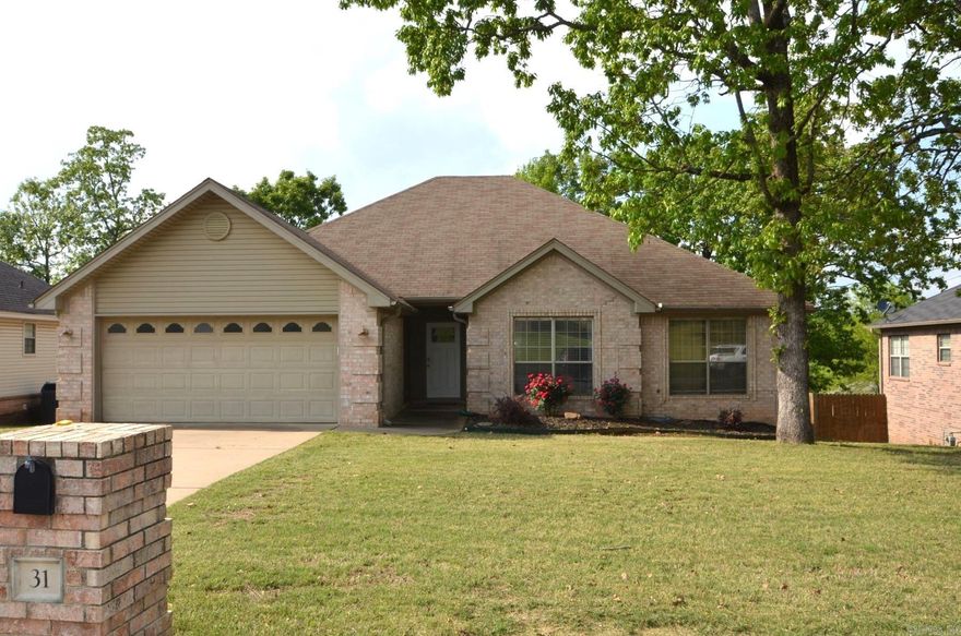 No need to click your heels 3 times and repeat, “There’s no place like home,” because here it is! Seller has been making quality changes to this precious family home & here’s your opportunity to follow tree lined roads to one of Maumelle’s finest family neighborhoods. The home features beautiful hardwood flooring throughout main living areas and updated carpet in the bedrooms. The living room presents a wood burning fireplace framed by a custom mantle. The Main bedroom is spacious and features a sitting area and classic rustic barn style sliding door to the Main bath. Main bath features his and her closets, a large soaking tub and double vanity. The nicely appointed kitchen features granite counters, stainless appliances, and plenty of custom cabinet storage. In a word, “HURRY!”