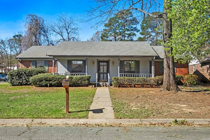 Lovely, well maintained home on a level corner lot in Maumelle! The sweet front porch welcomes you into this home with hardwood floors in the entry and newer carpet (2-3 yrs) throughout. The separate, formal dining room could also serve as a home office or playroom. The cozy living room features a fireplace with brick surround and gas logs. French doors lead out to the show stopping covered patio! You will want to spend your evenings outside when you see this great space! The eat-in kitchen includes an electric stove, newer dishwasher (2-3 yrs) and pretty oak cabinets. A separate laundry space, off the kitchen, includes a storage cabinet that the seller will leave. The primary bedroom boasts 2 closets and an ensuite bathroom with tub/shower combo. Two guest rooms share a hall bath. Roof is 2-3 years old, Water heater is 2 years old.