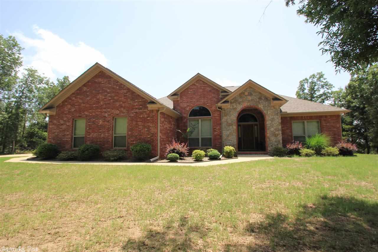 Beautiful home w/great views from the top of the ridge! All brick home close to Conway but Greenbrier school district. Wood floors in living room & formal dining room, tile in all wet areas. Propane fireplace w/logs & room for the flat screen above. 5 Star Energy Home built by Certified Green Home Builder. Home is all electric w/fireplace being propane. 4th BR could be used as office. Security system, Refrigerator to convey w/the property. Side entry garage. Driveway is shared w/easement to neighbors.