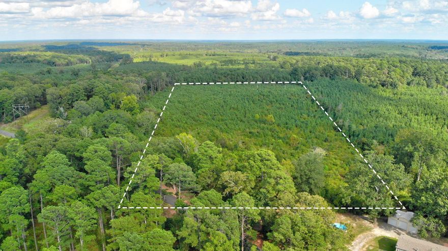 20 Acres on Country Road, all utilities are set up and property has a storm shelter.