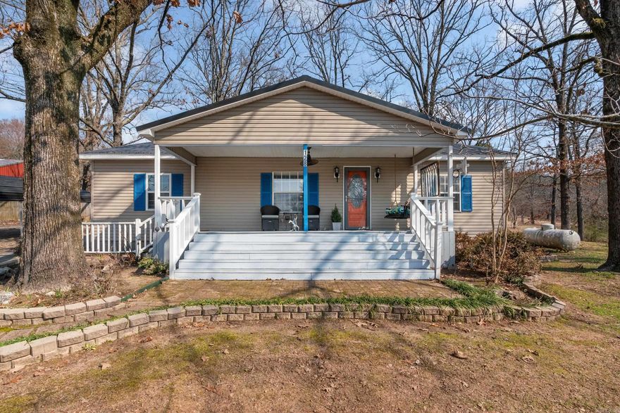 Own your dream home across from glistening waters!! Escape the ordinary and embrace the extraordinary! This captivating 1936 home, brimming with character and charm, awaits you, on a private wooded property across from Beaverfork Lake. Imagine soaking-up mornings views on the front porch, nestled amongst mature trees. This home offers peaceful tranquility while remaining close to downtown Conway and conveniences. Whether you're seeking a permanent residence, a weekend retreat, or a multi-generational gathering place, this unique property offers an unparalleled lifestyle experience. The home features a large shop/garage for hobbies, another storage space, RV parking, and a huge space in the back for a garden! Call today for your private showing. Agents see remarks.