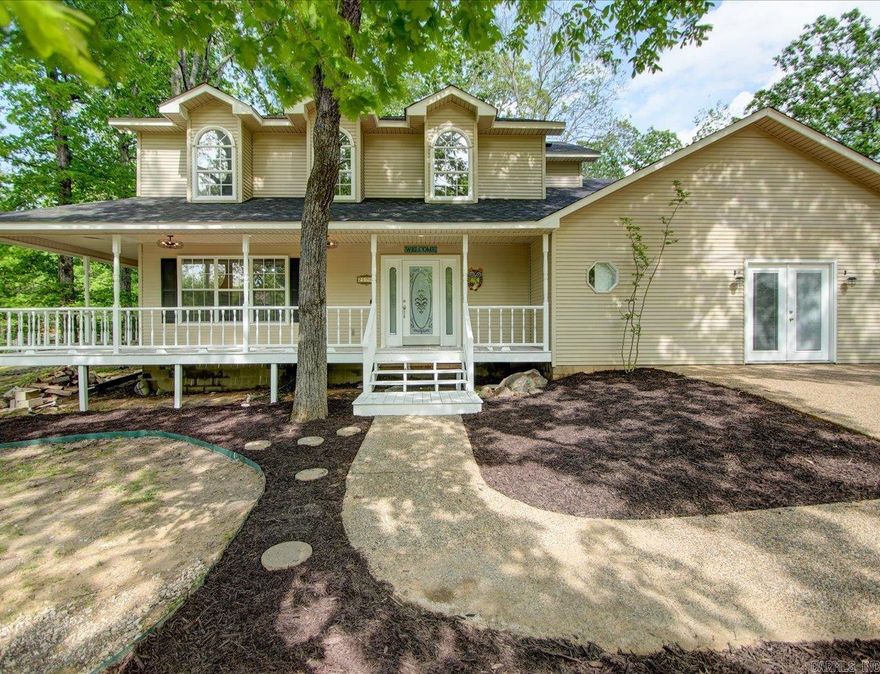 Completely remodeled 4 bed 2 1/2 bath home in Lake Hamilton School District! This spacious approximately 2300 sq ft house has an oversized bonus room that could be utilized as a secondary living room, office, or converted to the master bedroom. The kitchen showcases quartz countertops and stainless-steel appliances. Master bedroom has a nice tiled shower and a large custom double sinked vanity topped with quartz. Outside you will find a deck looking over the large fenced in backyard. Plenty of room for the kids and dogs to play!