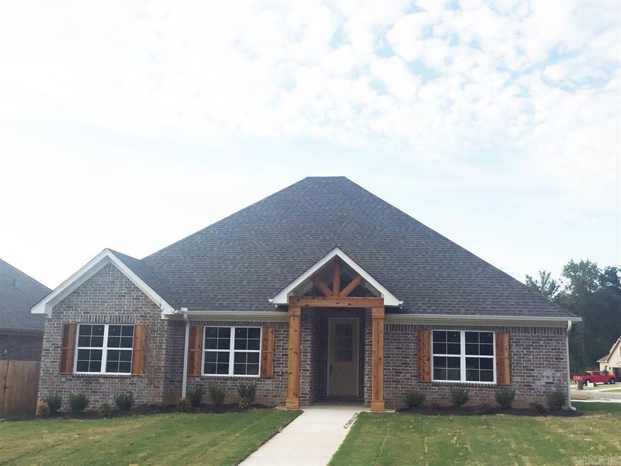 Beautiful 100% brick home . 4 bedroom 2 bath and a partially finished bonus room (not included in sqftg). Open concept with large kitchen island, granite tops throughout, hand scraped laminate flooring in main living areas. Large windows across back of house, so a ton on natural light! Large covered back porch. Corner lot with side loading garage.