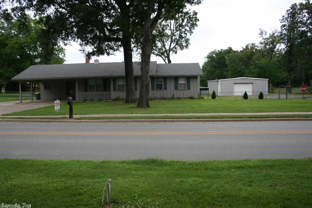 Come see this super nice home with updates. Kitchen has corian countertops & laminate floors. Bathrooms totally remodeled with Jacuzzi tub. Gas fireplace, sunroom, large bedrooms, outside newly painted, new duct work in attic. New roof in '09, large heated 30x50 pull thru shop all located on 6 acres that is great for deer & duck hunting. Sq. Ft. approx. measuring encouraged.