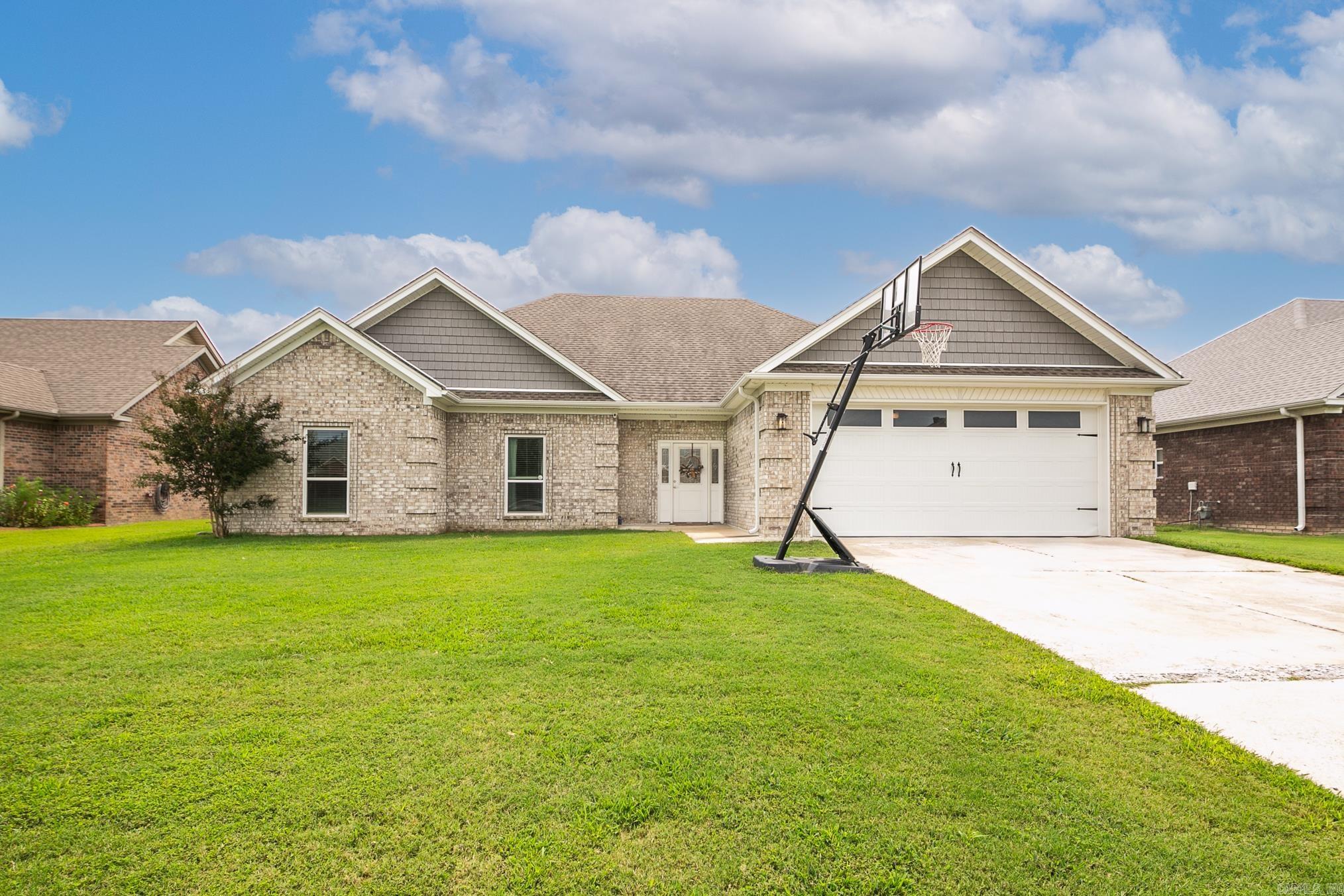 Well-maintained 4BR/2BA home in Lakewood subdivision with a desirable split floor plan. Features granite countertops, LVP flooring, a corner fireplace, spacious closets, and a private primary suite with walk-in shower. Walk-up attic provides much needed storage. Enjoy peaceful waterviews, a welcoming communityāand donāt be surprised if the friendly neighborhood ducks waddle by to say hello! Don't miss out on this beauty, schedule your showing today!! Agents See Remarks