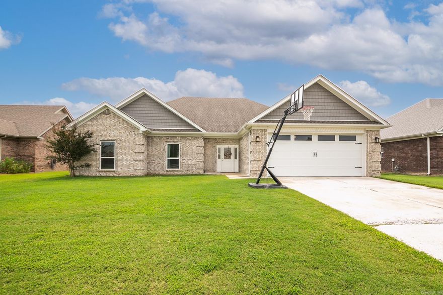 Well-maintained 4BR/2BA home in Lakewood subdivision with a desirable split floor plan. Features granite countertops, LVP flooring, a corner fireplace, spacious closets, and a private primary suite with walk-in shower. Walk-up attic provides much needed storage. Enjoy peaceful waterviews, a welcoming community—and don’t be surprised if the friendly neighborhood ducks waddle by to say hello! Don't miss out on this beauty, schedule your showing today!! Agents See Remarks