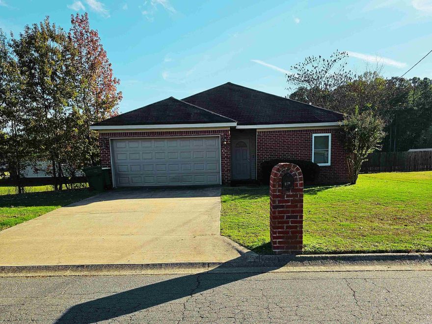 Welcome home to this charming three-bedroom, two-bath oasis, thoughtfully updated and perfect for those who love to entertain. Step into a newly renovated kitchen featuring modern finishes, sleek cabinetry, and stainless steel appliances. Natural light floods the living areas, thanks to new windows installed in 2022, creating a bright and airy atmosphere.   The living room and primary suite each boast a cozy fireplace, offering warmth and ambiance, making this home a true retreat during cooler months. Throughout the home, you'll find updated vinyl flooring, adding both style and durability, as well as modernized bathroom vanities that enhance the home's fresh appeal. A fully fenced backyard awaits, complete with a welcoming deck—perfect for relaxing, entertaining, and enjoying the seasons in privacy.  This home blends comfort, style, and modern updates, ready to welcome you with open arms!