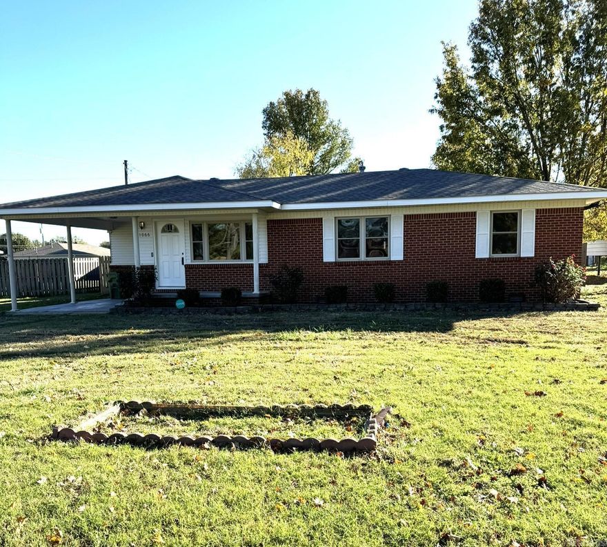 Remodeled brick home near downtown Walnut Ridge in beautiful established neighborhood. Extra large city lot has 1212 square foot home, 24 X 30 Shop with garage door, additional shop plus covered RV/tractor shed. Home features oversized living room with hardwood floors, kitchen has gas cooktop, wall oven and new dishwasher, spacious dining room and three ample sized bedrooms. Favorite feature is sunroom just off dining area for entertainment or just drinking coffee in the mornings. Easy access to shop garage, privacy fenced backyard or RV parking from city street (Morrison) running behind property. Garden area has concrete boundary for easy maintenance. Security light near shops and basketball goal. A must see for anyone looking for storage and a well maintained home. New shop garage door is on order and will be installed soon. Seller is a licensed Tennessee real estate agent and related to listing agent.