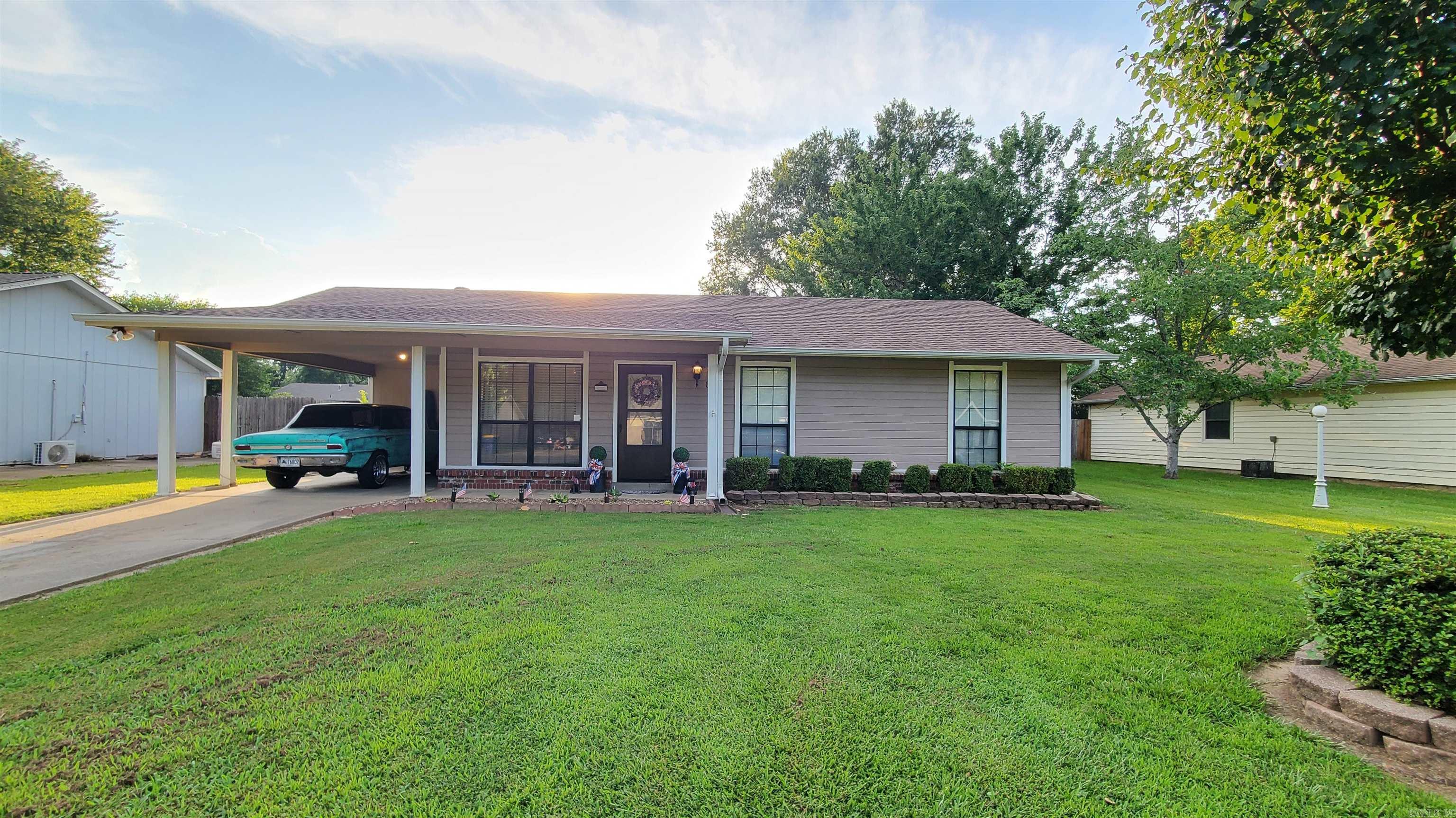Looking for a great home in a good location? Came see this very well maintained home with some great updates. New Roof and Gutters in 2022, New HVAC approx 7 yrs ago, all New LVP flooring 2022 (no Carpet). Nice Kitchen with newly stained Cabinets, Gas Cook Stove. Large Living room open to a good size Dining room that exits out to a great back yard, Concrete Patio, Landscaping and a Large Shop. Back inside down the hall you will find a full quest bath with Shower/tub combo, Master Bedroom ensuite with walk in shower and 2 other nice size bedrooms. Don't miss out on this one, Clean, move in ready and Great Curb appeal.