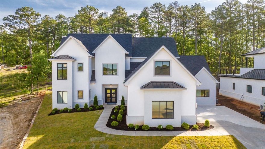 *POOL ADDED* Welcome to this exceptional back-on-market property, showcasing luxurious upgrades and an unparalleled level of craftsmanship. Situated in a desirable location, this stunning home offers an array of exquisite features and amenities that will captivate even the most discerning buyer.  Step inside to discover a wide open layout adorned with 26-foot ceilings, allowing natural light to flood the space and create an airy, inviting atmosphere. The builder has spared no expense in enhancing this home, adding a beautiful pool and outdoor living area, perfect for relaxation and entertaining guests.  As you explore further, you'll notice the meticulous attention to detail, with porcelain finishes adorning both fireplaces and wood accents throughout the house, exuding elegance and sophistication. The gold and Crystal chandeliers add a touch of opulence to every room, creating a truly luxurious ambiance.  This expansive residence boasts five bedrooms, including a magnificent master suite, and four full bathrooms along with a convenient half bath. The masterfully designed kitchen features top-of-the-line, high-end appliances that will delight any culinary enthusiast.  Welcome Home