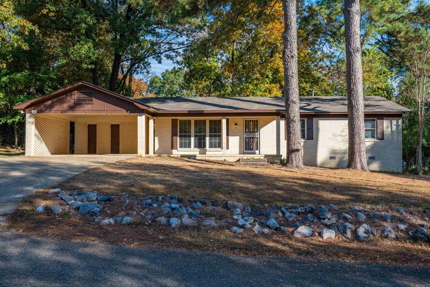 Priced to sell!  This neat and tidy 4 bedroom/2 bath home has pretty much newer everything.  Roof and HVAC both replaced within last 3 years.  Interior has been updated with newer flooring and both bathrooms have been updated.  Covered back deck and level, fenced backyard for everyone to enjoy. There is just enough room left with updating for you to own this great home and put some of your flair in it.  Lake Hamilton Schools.  Close proximity to the lake, shopping. medical, and restaurants. Don't diddle-daddle around and miss this one.