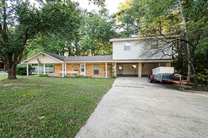 Freshly updated with new paint and flooring, this spacious property offers endless possibilities.   6 Bedrooms | 3 Bathrooms Plenty of room for a large family, or the perfect setup to divide into two separate units for rental income.  Located directly across from Parker’s Chapel School, convenience is right at your doorstep.  Whether you’re looking for a forever home with space to grow or an investment opportunity, this property is ready for you.