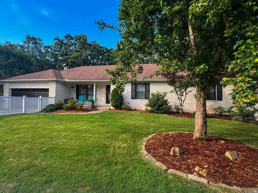 Newly landscaped, resodded, and exterior painted home on .48 acres in the heart of Little Rock. This location is loved for its ease of highway access but also the Don Roberts School Zone. A white vinyl front fence enhances privacy and creates additional flat usable yard space. Outdoor living is just as impressive as the interior, with a 10x20 screened-in porch looking at the private wooded backyard and a fenced area beneath the porch enhanced with turf installation (2020). Inside a cathedral ceiling in the 18’ x 20’ living room, natural light and custom built-ins frame the gas fireplace. Upstairs: Primary bedroom ensuite with 3 closets! 2 guest bedrooms + full bathroom, formal dining, living, and kitchen with eat-in. Incredible downstairs, where the fourth bedroom is equally as large as the upstairs primary suite, making it ideal for guests, older children, in-laws, or even a secondary primary suite option. The downstairs level also features a large rec room for movie nights or workout. The stair landing a flex space awaits. See update list. The privacy, multiple entertaining spaces + location makes this an exceptional opportunity for buyers seeking schools/work prox. and fun!