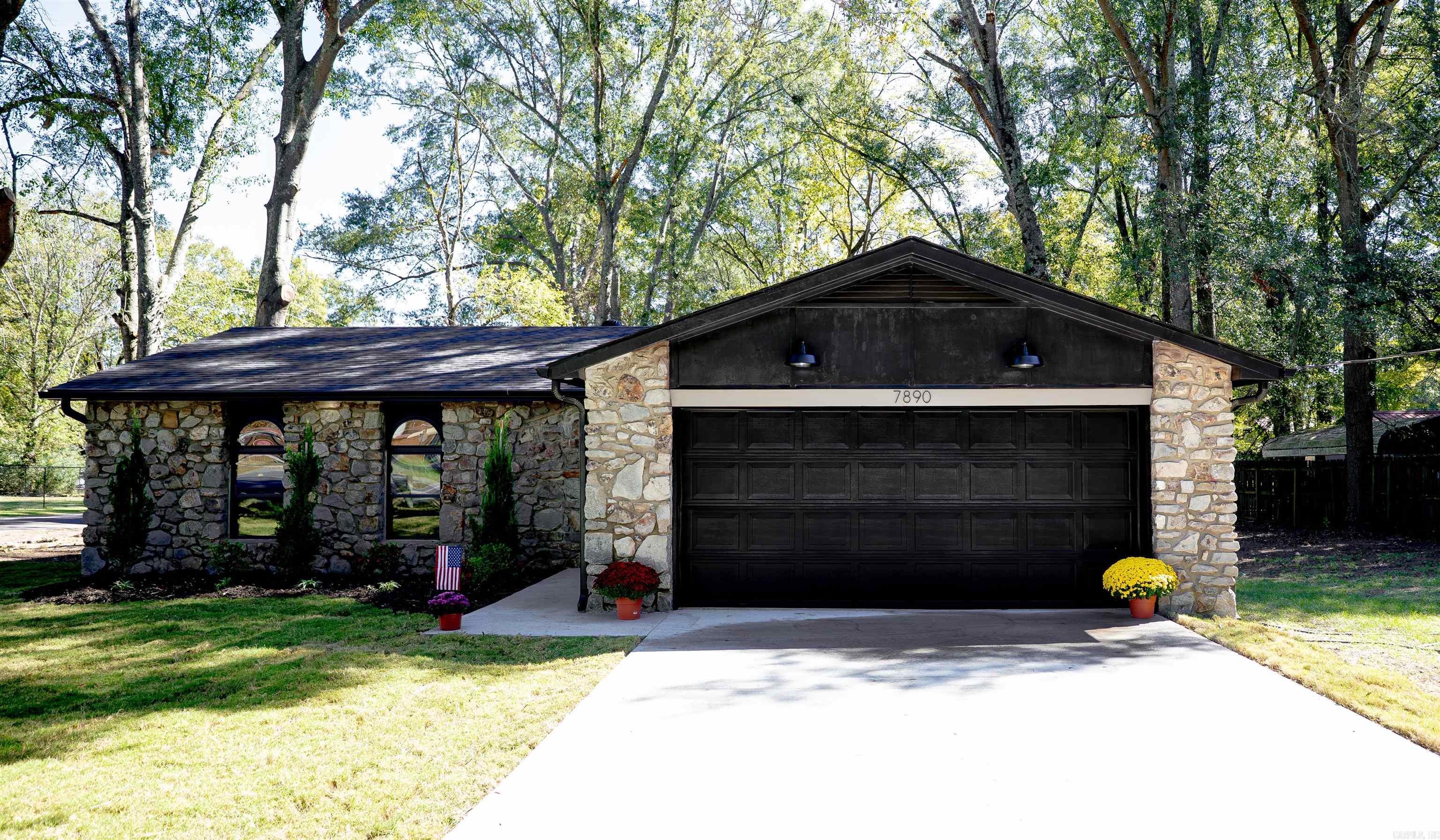 Fully Renovated Brick & Stone Home in Green Meadows on nearly Half an Acre! Beautifully updated home on a spacious corner lot in the established Green Meadows Subdivision. Located in the heart of the Salem Community the home is surrounded by mature trees and offers a peaceful, country feel with easy access to I-30, shopping, and local schools. Inside features a full renovation including new HVAC, roof, electrical, tankless water heater, and modern lighting throughout. Redesigned floor plan opens up the kitchen, breakfast, and family room for seamless living. Kitchen boasts all-new cabinetry, appliances, and finishes. Laundry room has extra cabinet storage and a closet. Primary suite includes a tiled walk-in shower. Two additional spacious bedrooms share a full hall bath. Flex room with closet off the entry can serve as 4th bedroom or home office. Additional highlights: ⢠Unique arched front windows ⢠New driveway & entry walkway ⢠2-car garage ⢠Back patio ⢠Large backyard with standalone storage building Only 1.3 mi to Salem Elementary, 1.6 mi to Bethel Middle, and <5 mi to I-30 & shopping.