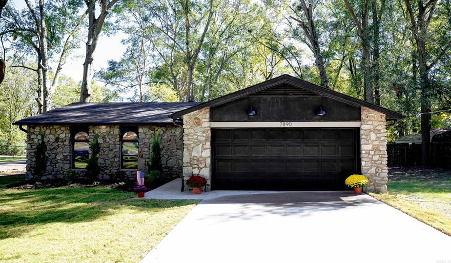Fully Renovated Brick & Stone Home in Green Meadows on nearly Half an Acre! Beautifully updated home on a spacious corner lot in the established Green Meadows Subdivision. Located in the heart of the Salem Community the home is surrounded by mature trees and offers a peaceful, country feel with easy access to I-30, shopping, and local schools. Inside features a full renovation including new HVAC, roof, electrical, tankless water heater, and modern lighting throughout. Redesigned floor plan opens up the kitchen, breakfast, and family room for seamless living. Kitchen boasts all-new cabinetry, appliances, and finishes. Laundry room has extra cabinet storage and a closet. Primary suite includes a tiled walk-in shower. Two additional spacious bedrooms share a full hall bath. Flex room with closet off the entry can serve as 4th bedroom or home office.  Additional highlights: • Unique arched front windows • New driveway & entry walkway • 2-car garage • Back patio • Large backyard with standalone storage building  Only 1.3 mi to Salem Elementary, 1.6 mi to Bethel Middle, and <5 mi to I-30 & shopping.