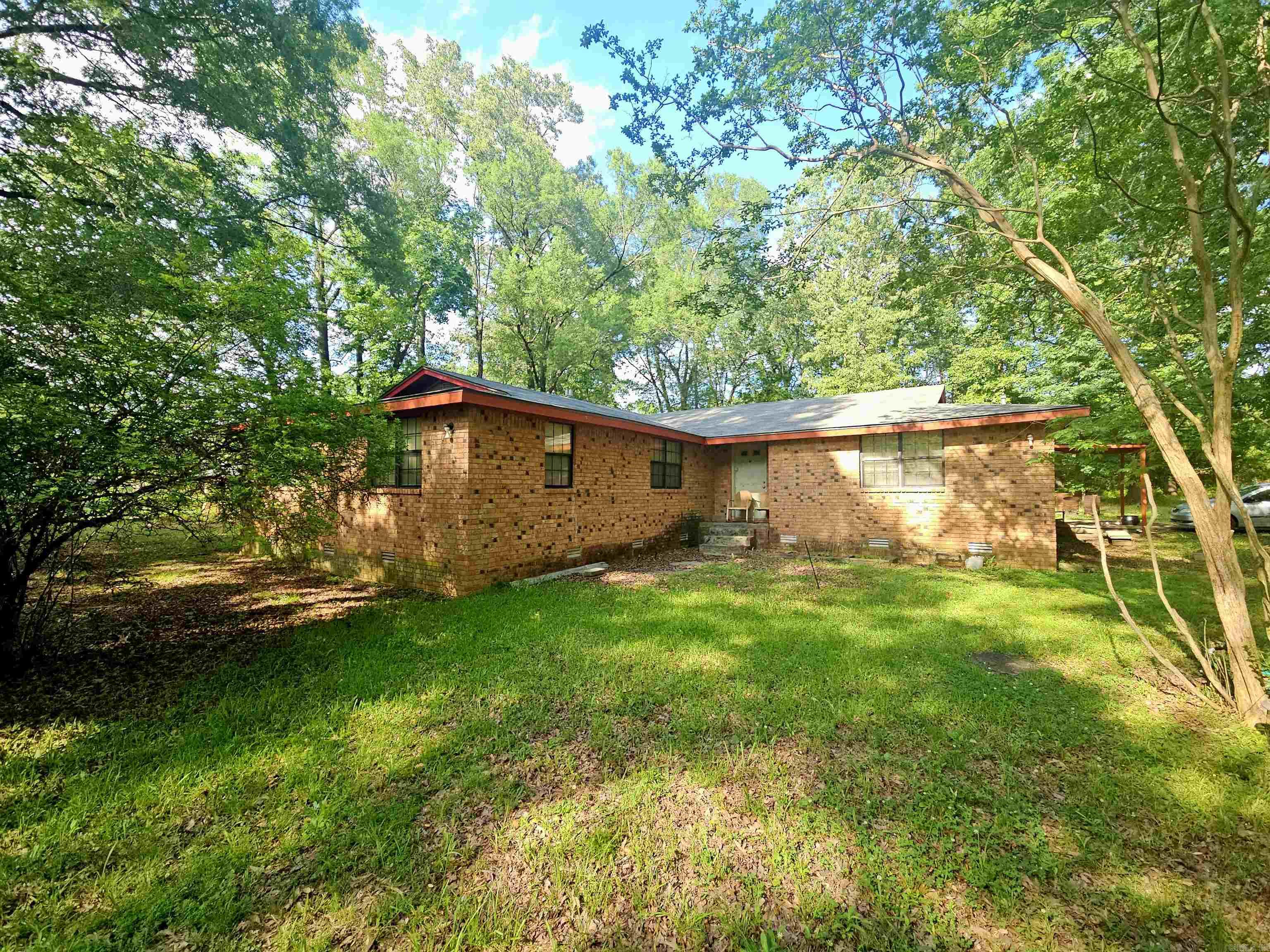 This one has potential! 4 bedroom, 2 bath home sits on approx. 1.5 acres. NEW roof in 2025 and NEW septic tank in 2024. All on one level, the layout includes spacious bedrooms and is ready for your updates. The fully fenced yard provides privacy, room to roam, and space for pets or gardening. Plus plenty of storage. Whether you're looking for a fixer-upper to live in or an investment project, this property is a great starting point.