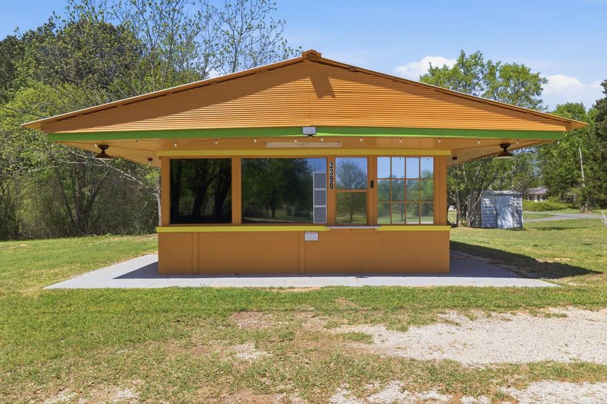 Prime commercial opportunity with incredible versatility on 0.64 acres in a high-visibility location just off I-30 on Highway 67 in Friendship, conveniently situated between Malvern and Caddo Valley. This 459 sq ft building is packed with value and ready for your next business venture.  A large amount of commercial-grade restaurant equipment conveys with the property—nearly all holding ETL certification—making this an excellent candidate for a dairy bar, to-go restaurant, or similar concept (note: vent hood not currently installed).  Recent improvements include fresh exterior paint, a replaced grease trap, an upgraded electrical panel, and a new energy-efficient, ETL-listed 1.0-ton inverter mini-split system for heating and cooling.  The property also includes a storage building that will convey, along with ample space for parking, expansion, or additional business use.  With its flexible layout and prime location, this property is also well-suited for a variety of other uses such as a beauty salon, office space, car lot, or other commercial endeavors.  Don’t miss this affordable opportunity with endless potential!