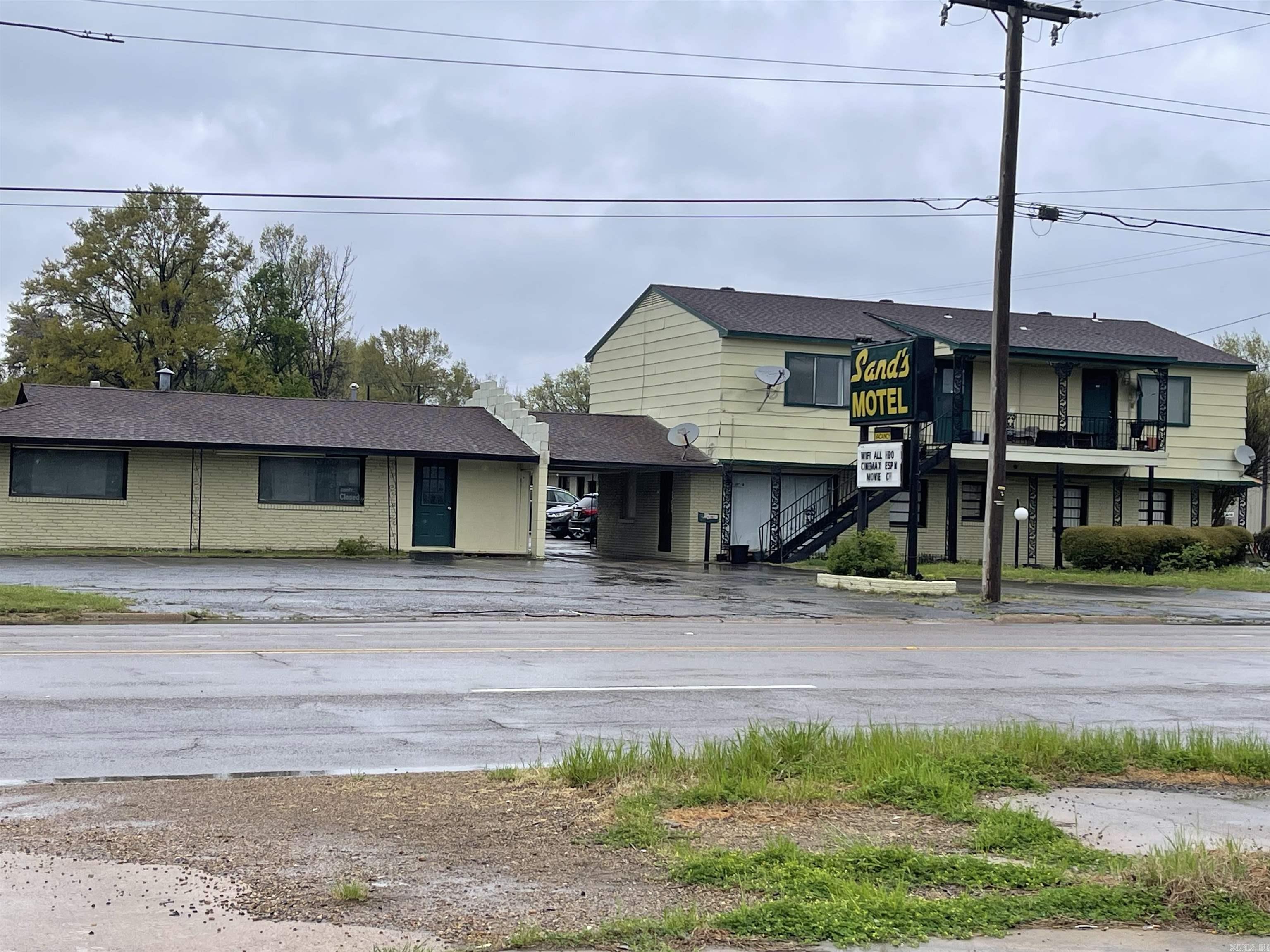 ATTENTION ATTENTION INVESTORS!!! Here's an investment opportunity waiting just for you! Sands Motel is one of the oldest businesses in West Helena. It features 26 rooms with single & double beds, with some furnishings new, updated bathrooms, TVs with satellite & cable, microwaves, refrigerators, & Wi Fi internet. It has an attached inoperable restaurant. Did I mention there is a great need for more restaurants in the area? Well, there is! With renovations & re-opening, this restaurant could thrive while adding value and additional income. This property is located in the heart of West Helena with high visibility & high traffic volume. Call today and schedule your appointment to tour this great investment property.