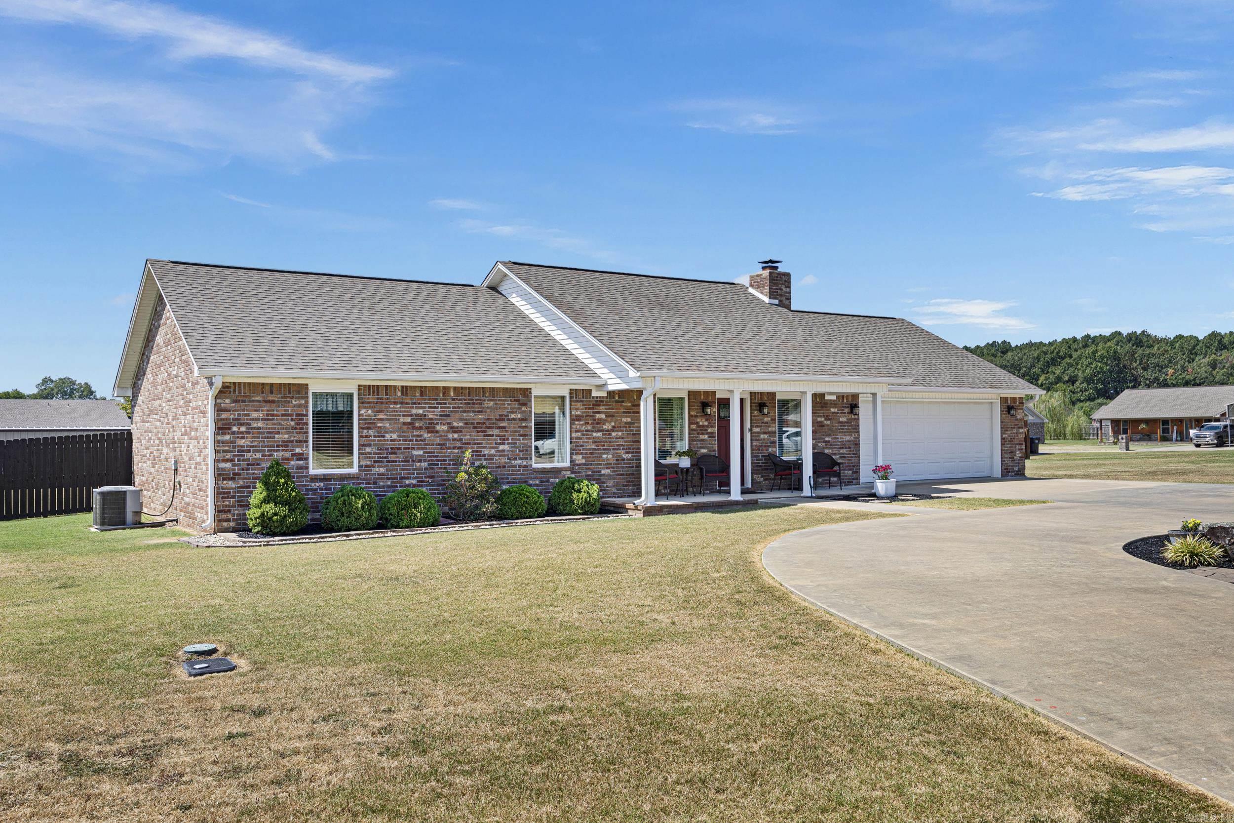 Curb appeal, curb appeal, curb appeal! This home greets you with a charming circle drive and keeps impressing inside with tray ceilings, stained concrete floors, and an oversized garage. The master suite is a true retreat with a gorgeous master bath. Enjoy a covered back patio and privacy-fenced backyardāperfect for relaxing or entertaining.