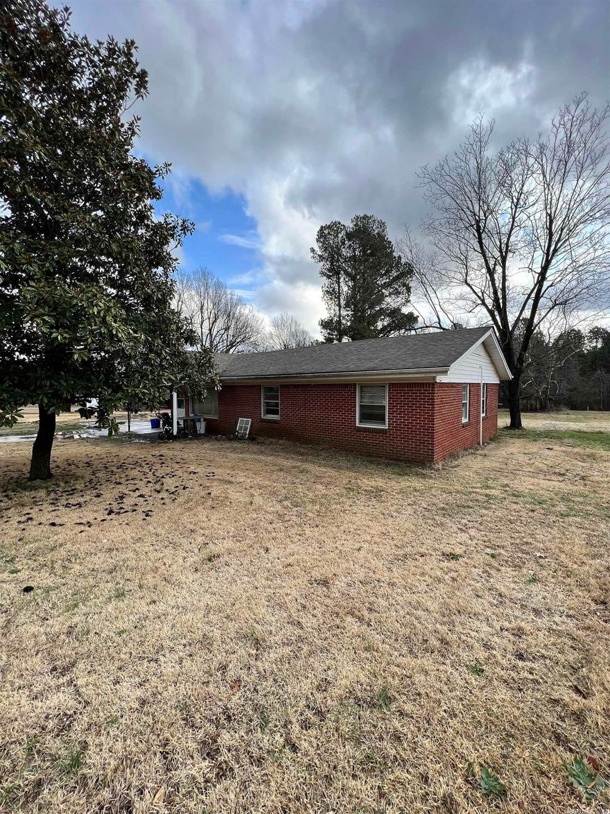 Cute brick home, on 1.6 acres! This home in the country offers seclusion, while still being close to town! Featuring a workshop, with a little TLC, this one could be a great opportunity for First Time Homebuyers, or investors!