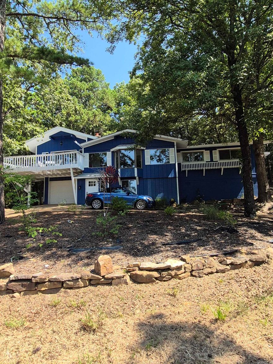 Lovely remodeled home.  Seller will finance credit worthy buyer with 20% down at 5% interest, interest only payment with a two year balloon.  This home has beautiful seasonal lake views from the street.   2 or 3 bedrooms, 2 baths, a great room with a gorgeous new kitchen cabinets, countertops and appliances, and a large separate family room which can function as an office as well, or use as an amazing large MBR with fireplace and private 350' deck with winter lake views.   Adjoining the kitchen is a combo laundry room/butler's pantry with lots of storage and counter space!  Luxury vinyl plank and carpet.  New HVAC in 2020 and new roof in 2020. Private back yard with firepit and abundant entertaining space.  A great vacation get-away or permanent home on large corner lot in a great lake neighborhood.  Being on a septic system reduces the amount of Fairfield Bay dues by over $100 per month.  Non-homesteaded taxes. Call to see this beauty today.  Measured by seller who is an architect.