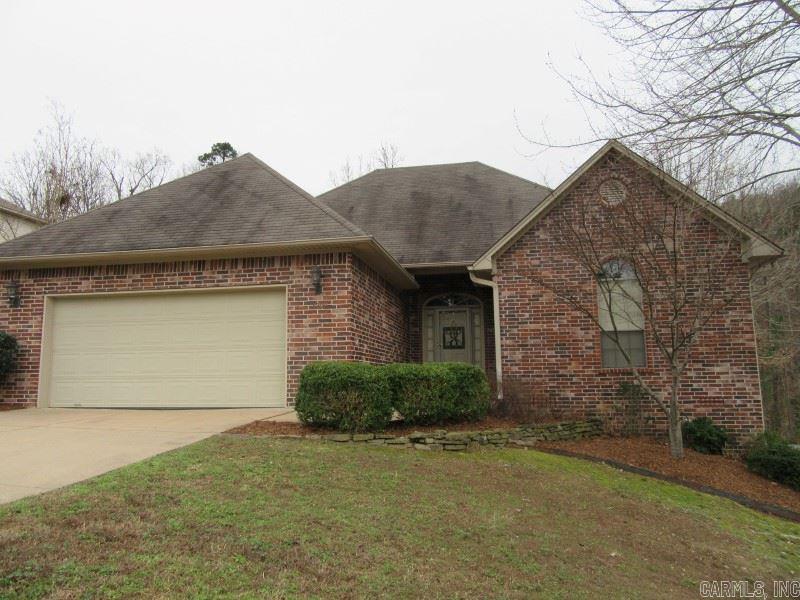 One level brick on secluded, private lot- nature lovers paradise with natural waterfall; newly stained covered deck. New handscraped hardwoods, stove, microwave, carpet and fixtures in 2015. Versatile floor plan with dining, office or music room. Kitchen has granite, breakfast bar, tumbled marble backsplash, study desk, stainless steel appliances. Don Roberts Elementary. Immaculate! New roof and water heater March 2017.