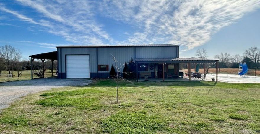 A FARMHOUSE RETREAT! You get a lot of LIVABILITY in this 4 bedroom, 3.50 bath BARNDO located 15 minutes from Batesville! OPEN concept floor-plan with living room/kitchen, dining area, 2 bedrooms, 2 full baths, a laundry room AND pantry downstairs. UPSTAIRS provides the perfect sized recreation area for entertaining pleasure! 2 additional bedrooms and a full bath offer plenty of room to play and sleep. HORSES welcome! 29.62 ACRES of fenced and cross fenced pasture with a BARN. PARTY ALL SUMMER under the large covered patio then make a splash in your in-ground POOL! Designed for entertaining, family and friends will enjoy this HOME as much as you!